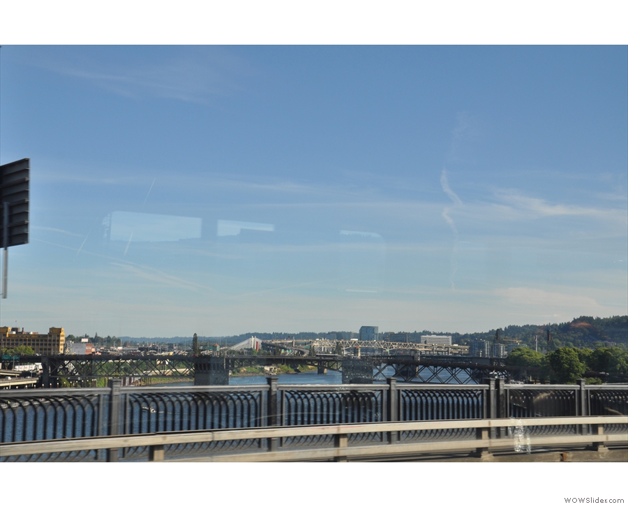 Here I am, crossing the Hawthorne Lift Bridge, looking downriver (north), Portland to my left.
