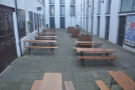 ... and you'll find a whole courtyard, complete with picnic tables! Great for when it's warmer.