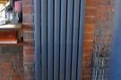 One of those radiators the A-board was on about, cleverly mounted vertically to save space.