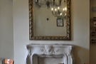 I was particularly fond of the mirror above the fireplace. And of the fireplace itself...
