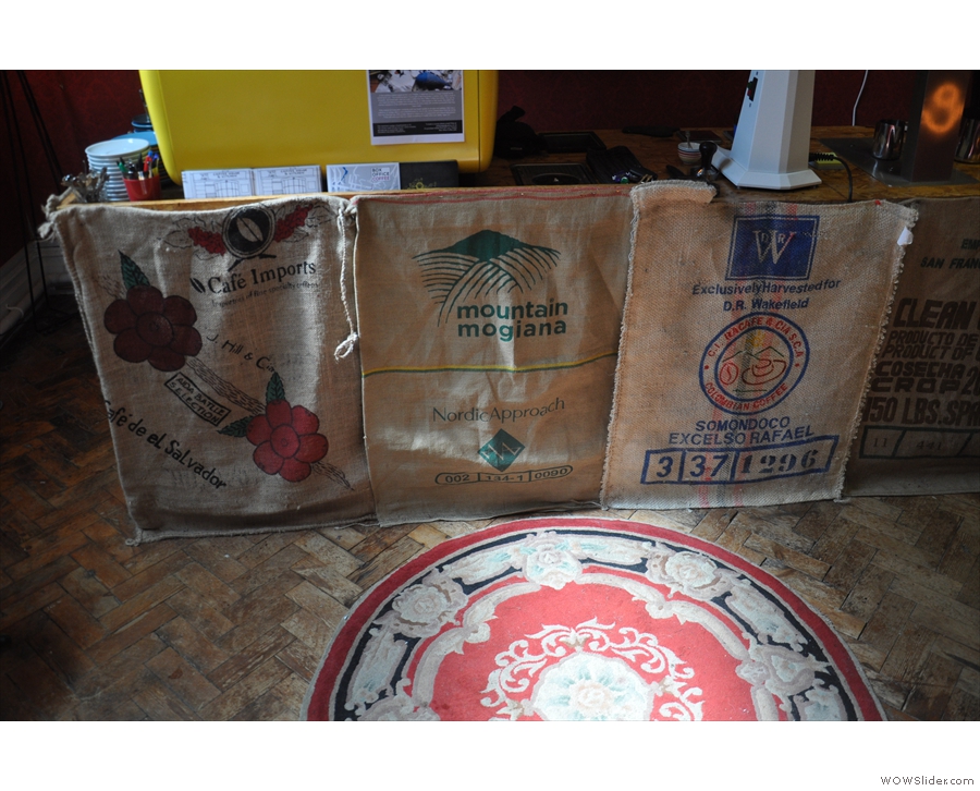 The counter itself is faced with these old coffee sacks...
