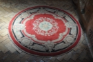 ... and there's this lovely rug on the floor in front of it. The floor itself is pretty amazing.