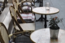 The massed ranks of tables outside Coffee Barker, giving it a very Parisian feel.
