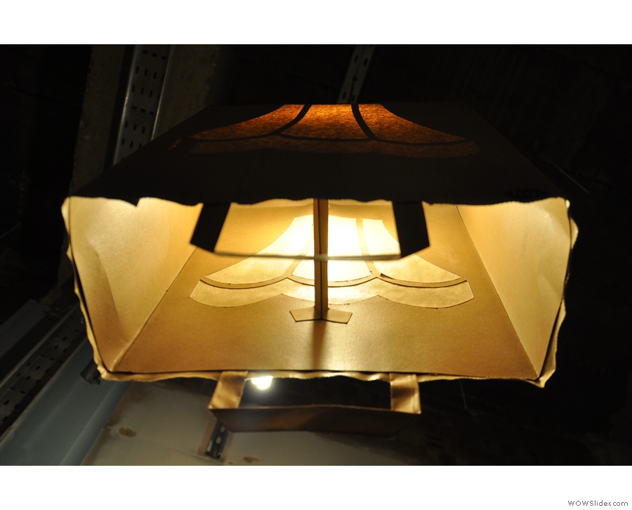 I've never seen a paper bag used as a lamp-shade before. Have you?