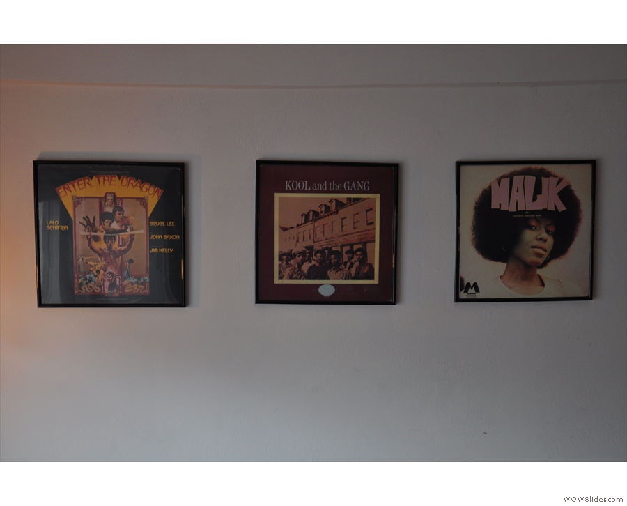 The other wall is decorated with old LP covers.