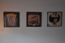 The other wall is decorated with old LP covers.