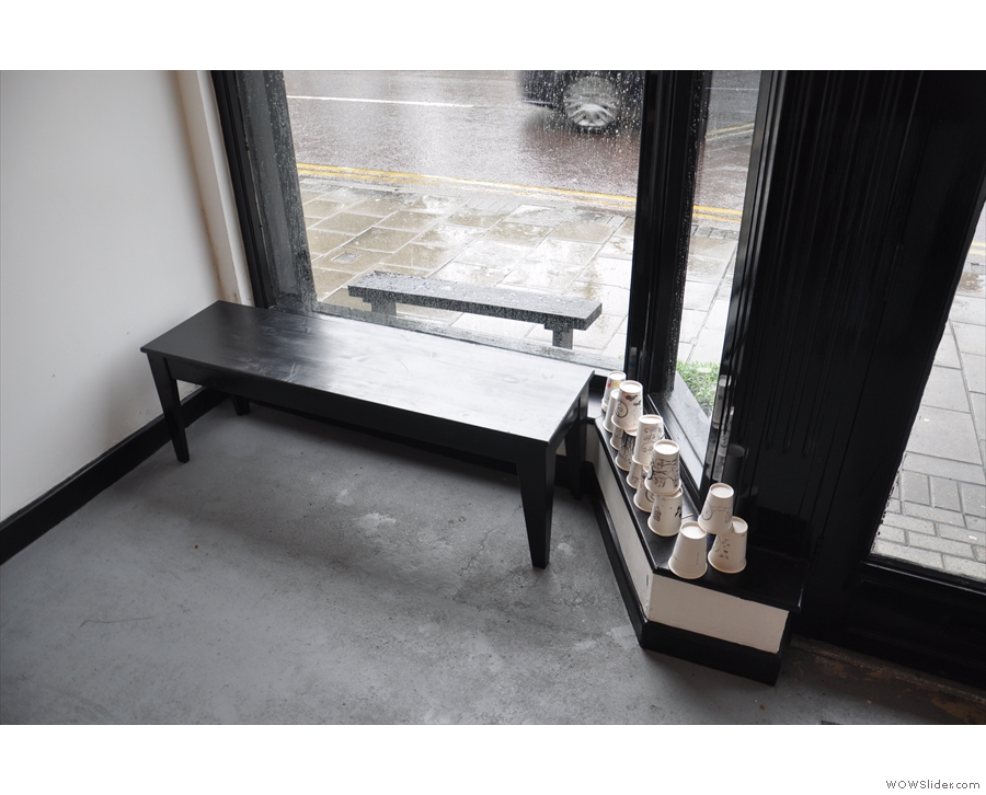 There's a choice of seating, including this bench in the window to the right of the door...