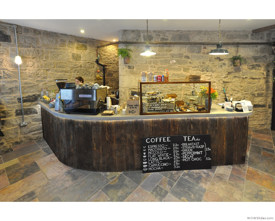 The counter is made of recycled 150 year old wood, plus a bespoke concrete top.