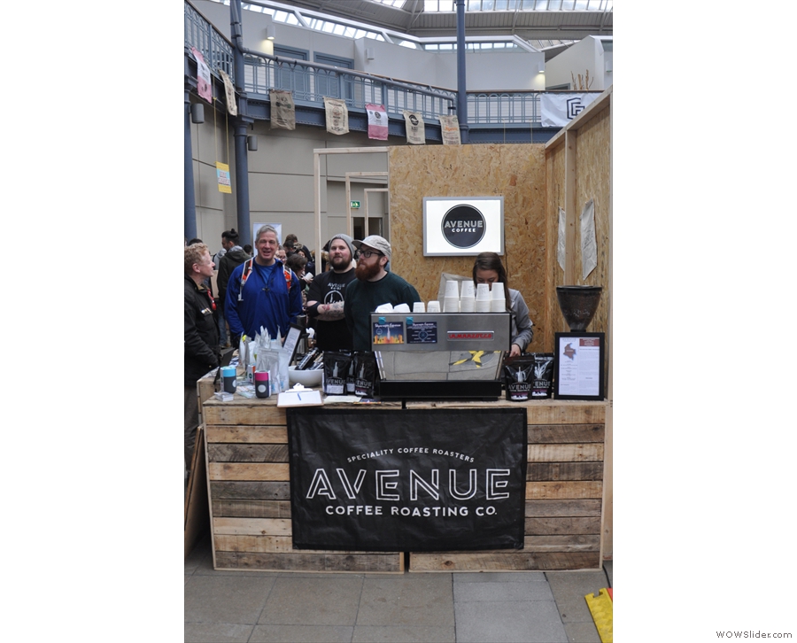 Okay. Time for my first coffee of the day. Now, who's that at the Avenue Coffee stand?