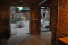 Beyond the rows of seats is Ancoats' second entrance, which leads to/from the courtyard.