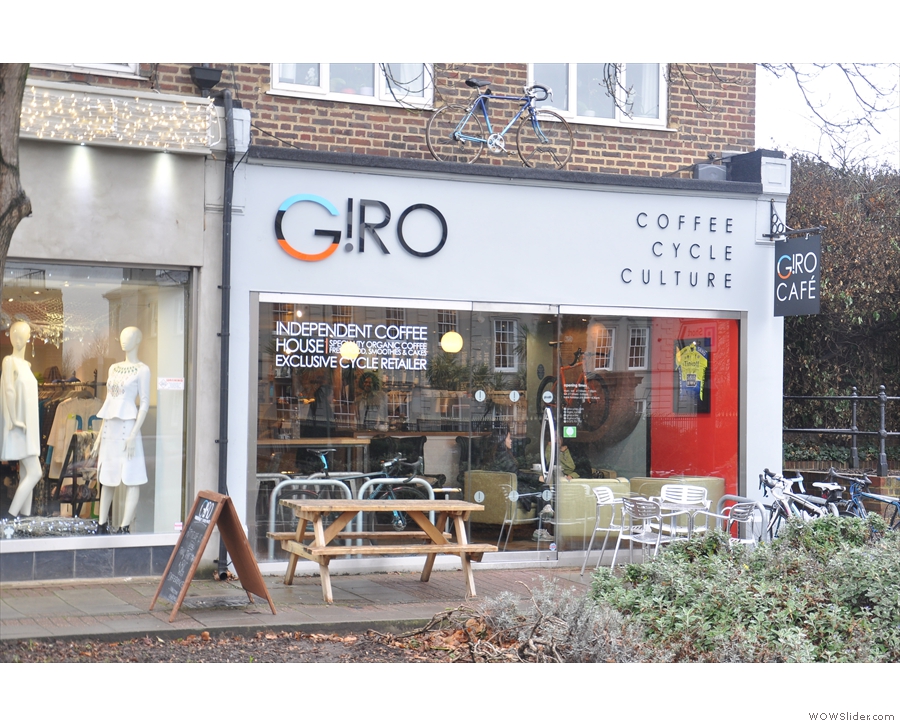 Giro Cycles, on the High Street in Esher: coffee, cycle, culture. And a bike on the roof!!