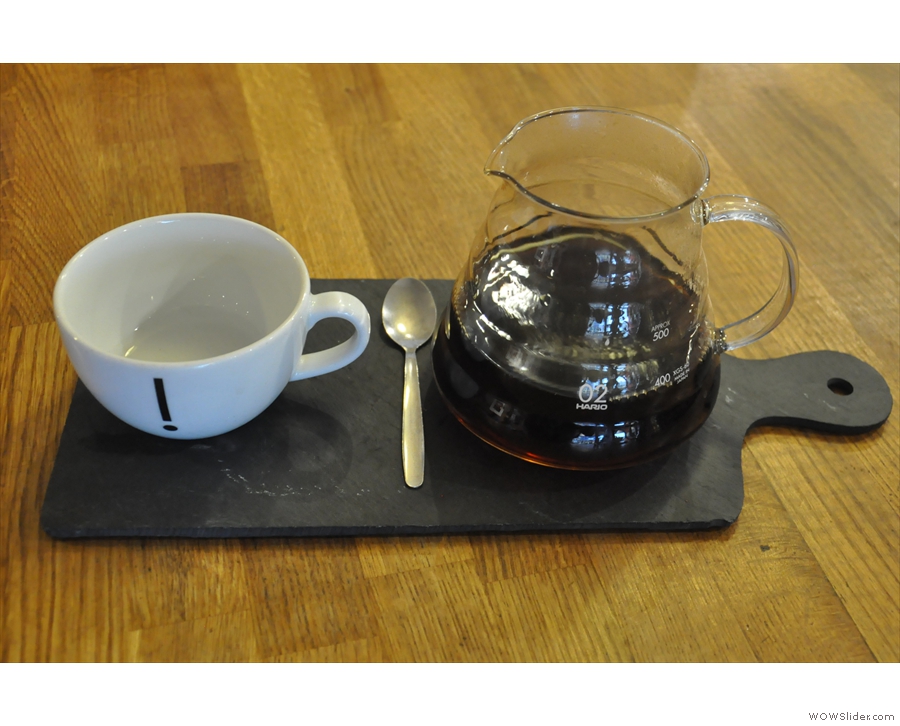 My coffee, beautifully presented on a slate, cup on the side, just how I like it.