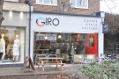 Giro Cycles, on the High Street in Esher: coffee, cycle, culture. And a bike on the roof!!