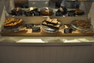 Meanwhile, down below, and safely behind glass, are even more cakes!
