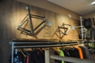 At the top of the stairs, there's this retail area, with more clothing & bike frames on the wall.
