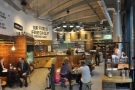Stepping inside, a panoramic view to the right, looking towards the counter.