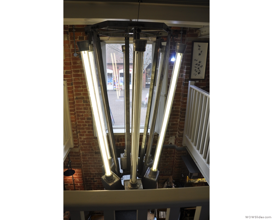 One of the best features is this strip light chandelier in the light well...