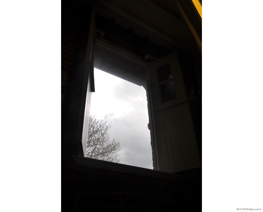 The view of the window on the first floor, seen looking up through the light well.