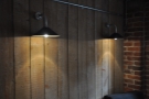 I like both the lght fittings and the wood cladding on the walls in this shot.