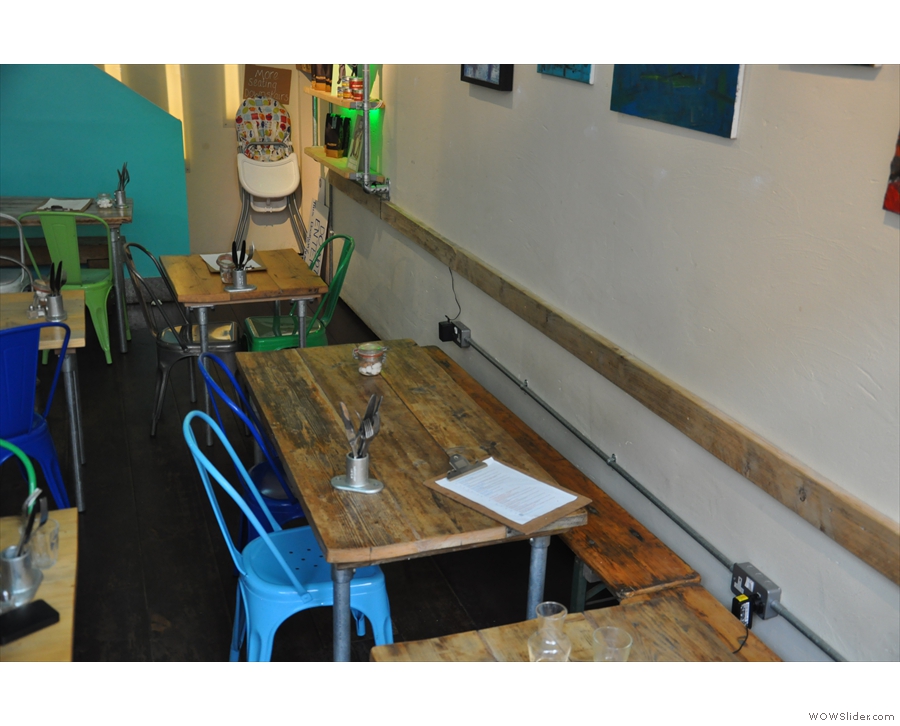I really liked these four-person tables up against the wall.