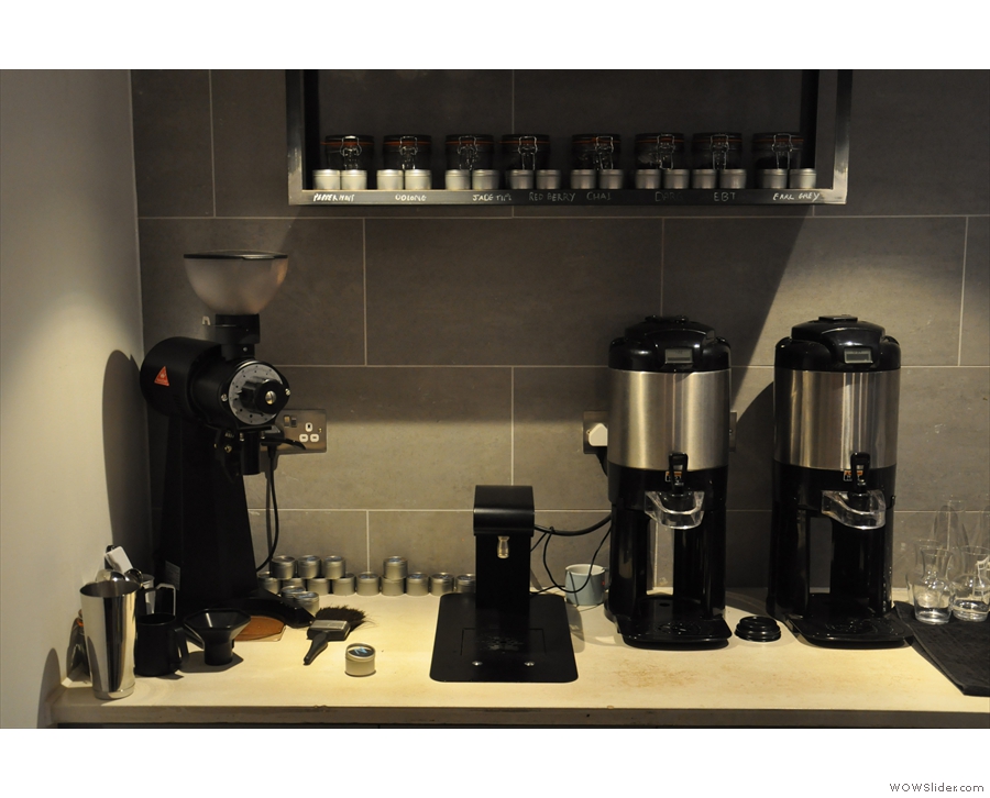The EK-43 (for the filter), hot water and bulk-brewers are behind the espresso machine.