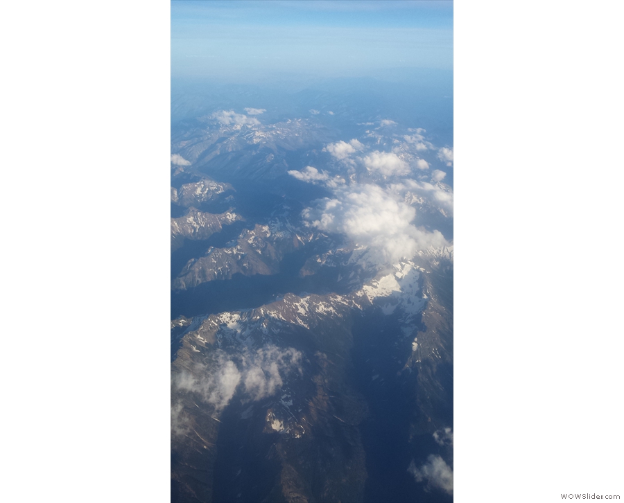 Soon we were flying high over the Rockies. What amazing views! Click the picture for a map.