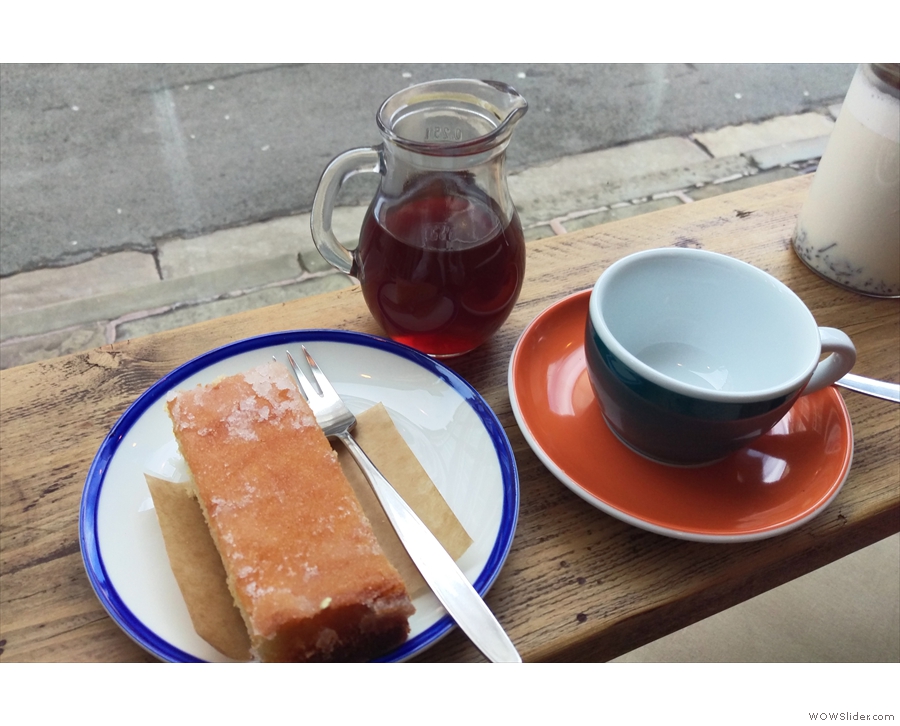 My pour-over, served in a carafe, complete with slice of lemon drizzle cake.