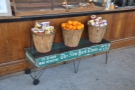 ... and beneath them, some oranges, flanked by pots of oatmeal. Nice trolley by the way.