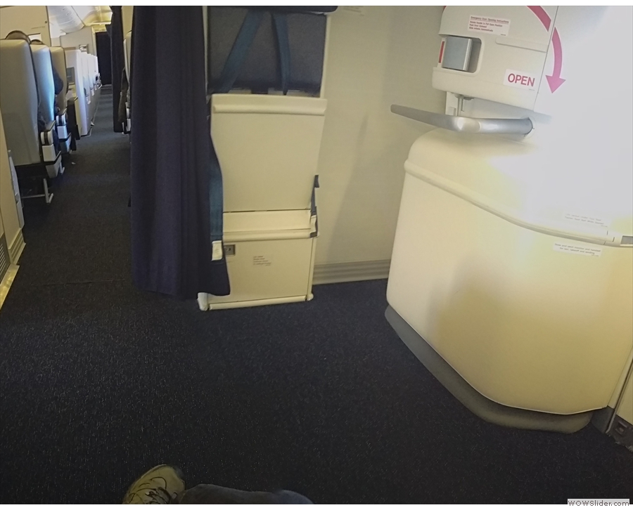 This, by the way, is why I pay for an exit-row seat. Look at all that leg-room & space!