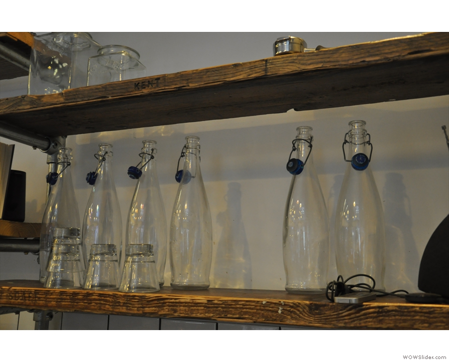 Curators has some nice touches, such as this line of bottles waiting to be filled with water.
