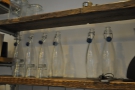 Curators has some nice touches, such as this line of bottles waiting to be filled with water.