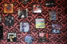 The walls are decorated wth old LP covers, with a heavy emphasis on heavy metal.