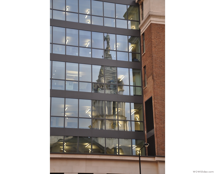 I love the reflection of the church spire in the windows of the office block opposite.