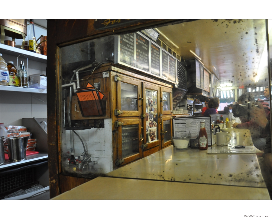 More changes: there used to be a large mirror on the back wall at the end of the counter.