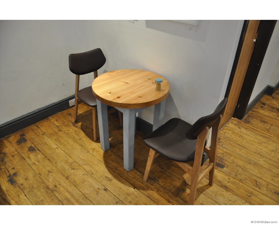 ... while this cosy little table for two is at the back.