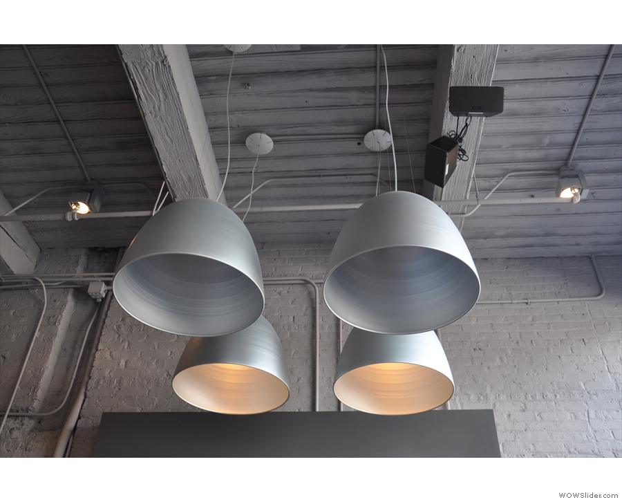 ... with lots of industrial-style lighting. These hang in the raised area to the right of the lobby.
