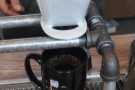 Note that the water is still filtering through when the mug is full, a common technique.