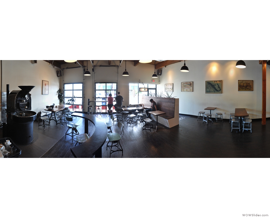 A panoramic view from the back of Heart, standing just in front of the counter, taking in the view from the roaster, on the left, to the entrance-way on the right.