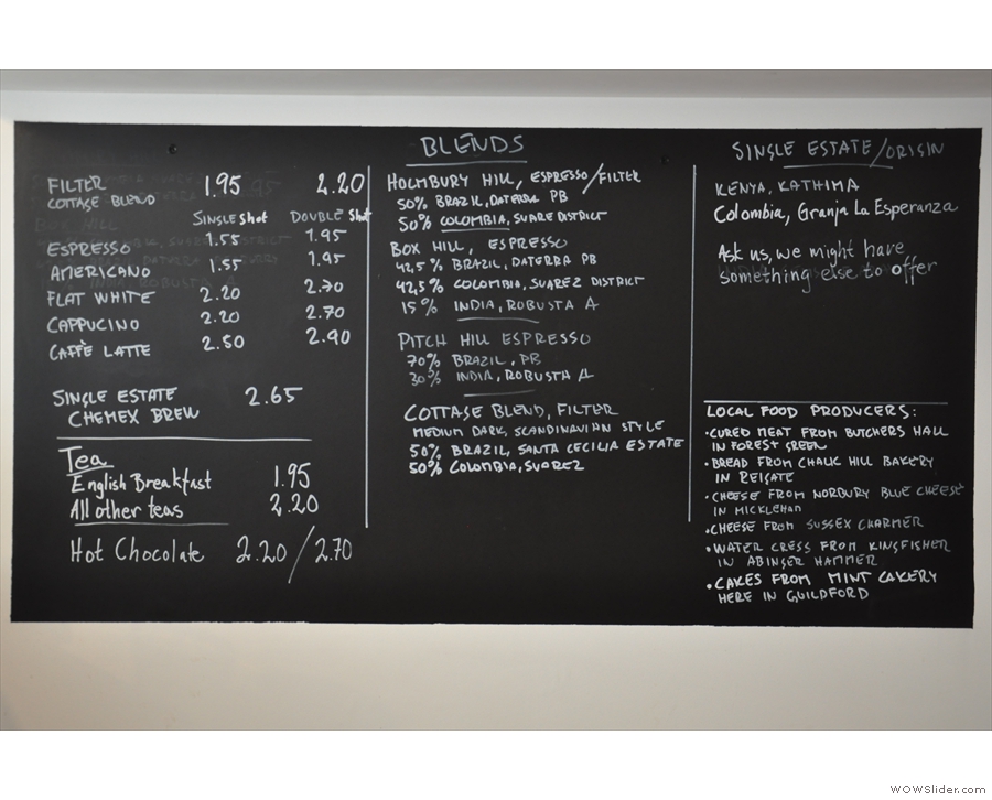 The menu boards behind the counter are a mine of information about the coffee.