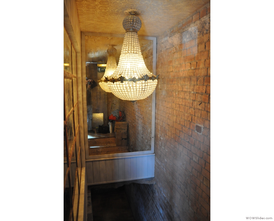Revealing a secret passageway with an amazing light-fitting (and another mirror)...